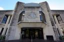 Two men from Rotherham have denied multiple assaults at Swansea Crown Court.