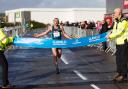 Carmarthenshire runner Dewi Griffiths crosses the finish line