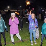 Youngsters were having fun with sparklers at the fireworks