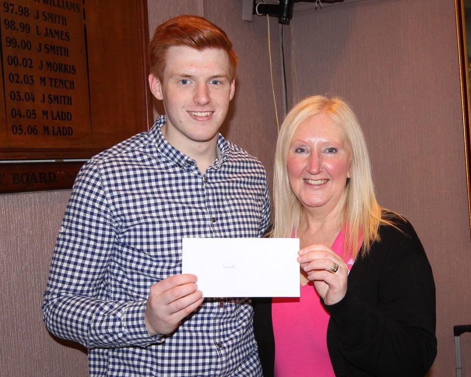 Gareth Elward aged 21  was diagnosed with liver and bowel cancer receives a cheque from Sandra Davies. Pic: SDD
