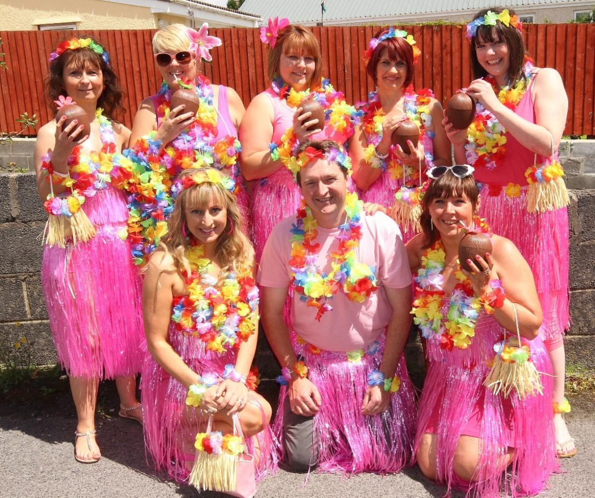 The drinks are on us say the Hula Lotta Pink team. Pic: SDD
