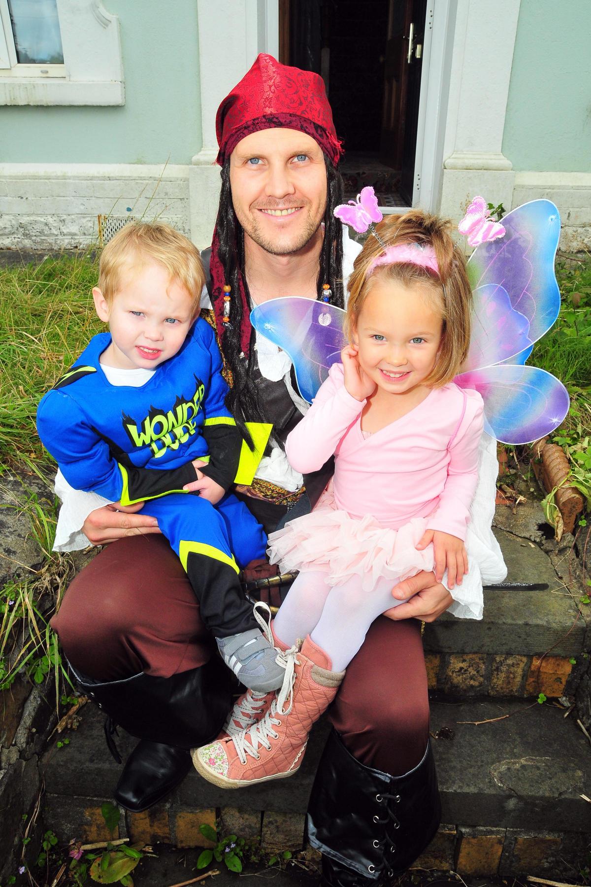 Paul Walters with son Ollie (2) and daughter Isabel (4) enjoy Gorslas Carnival.  Picture by Mark Davies