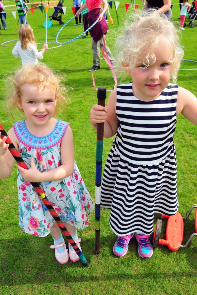 Anwen (3) and Bethan Quinlan (5) enjoy the Circus Dayze arena.  Picture by Mark Davies