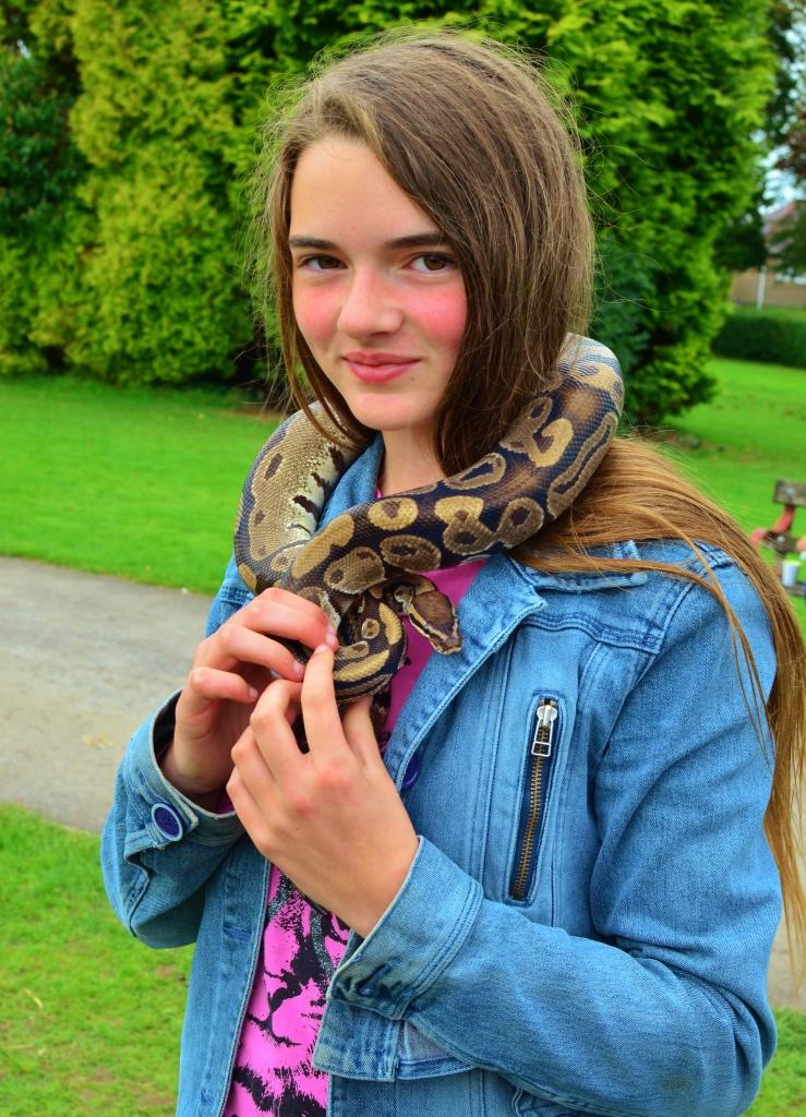 Lucy Dawson, 11, of  Garnant. Snake courtesy of J F M Exotics. Pic: Melissa Lewis