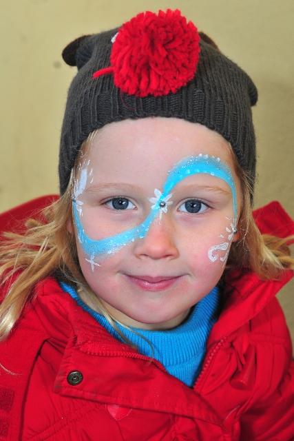 Six year old Angharad Evans has her face painted at Llandeilo's Festival of the Senses.  Picture by Mark Davies