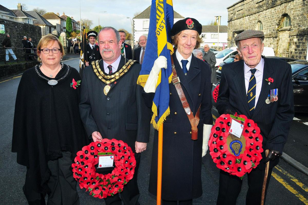 Llandeilo mayor Colin Jenkins with standard bearer Bobby Lewis and Royal British Legion member
George Fleming. Picture: Mark Davies