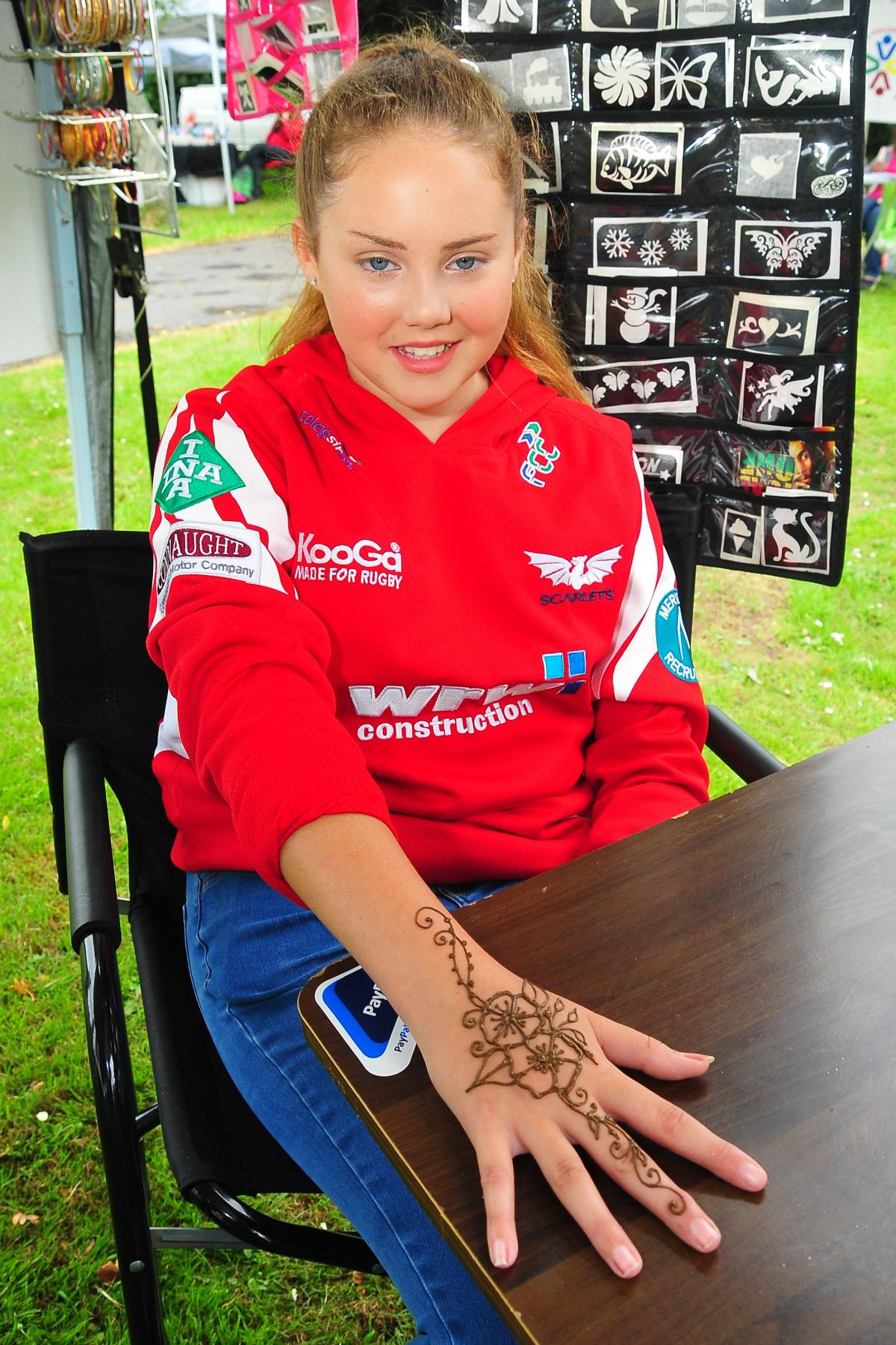 Thirteen year old Amy Slee shows off her Henna Tattoo.