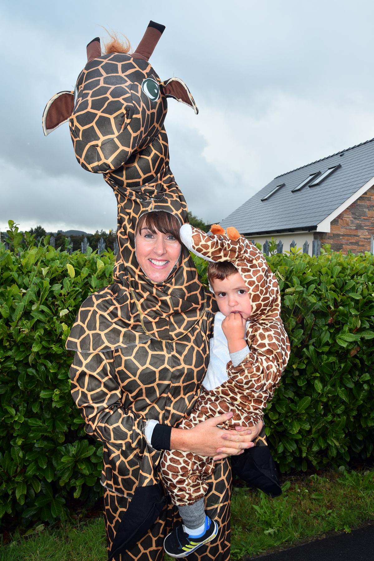 Feeling a little giraffe? Sharon and Sam from Cae'r Ffair Nursery. Pic: Mark Davies.