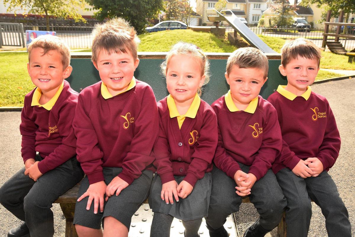 Gruffydd, Twm, Olifia and Joseff have just started school at Ysgol Saron. Pic: Mark Davies