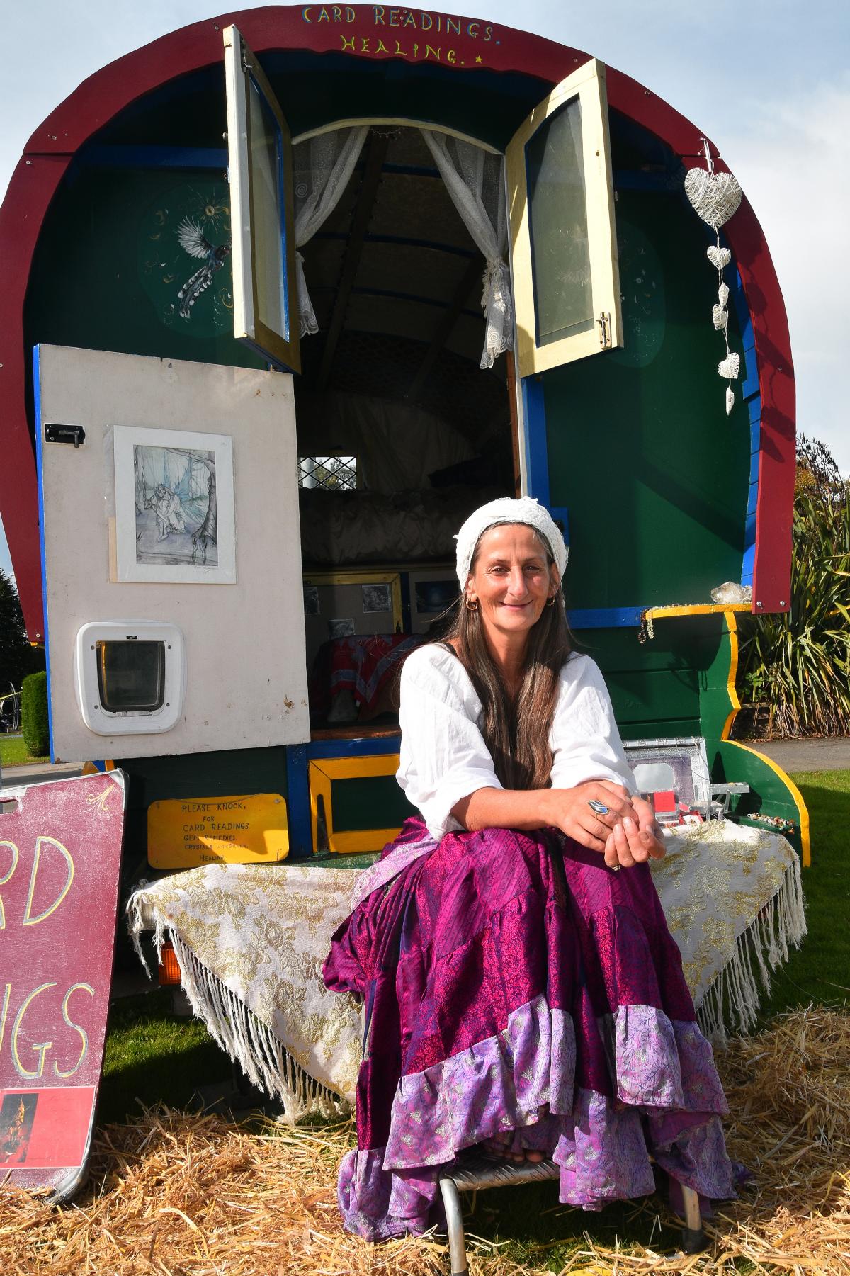 Maggie Magenpie tells fortunes from her traditional Romani bowtop caravan.  Pic Mark Davies
