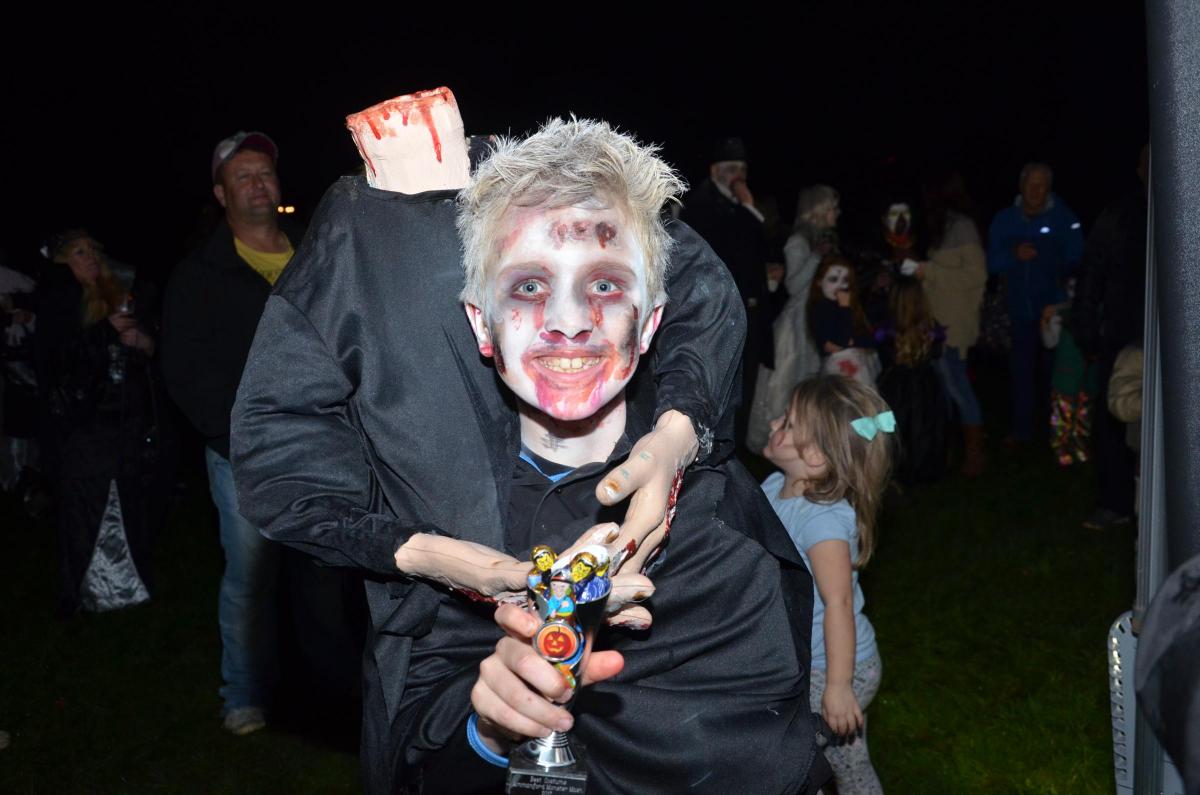 Residents join the Monster Mash Parade in Ammanford. Pic: Alex Smith (AEP)