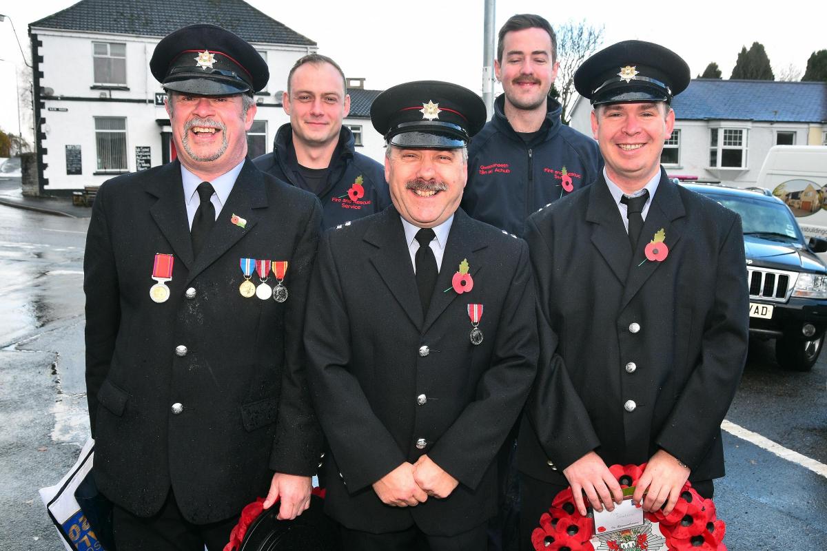 Llandeilo's fire fighters join the Remembrance Day Parade. Pics: Mark Davies