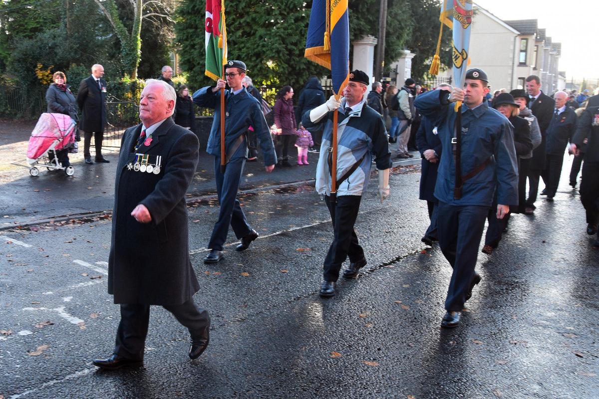 Major Ken Burton, president of the Ammanford branch of the Royal British Legion leads the Memorial Parade towards the church.