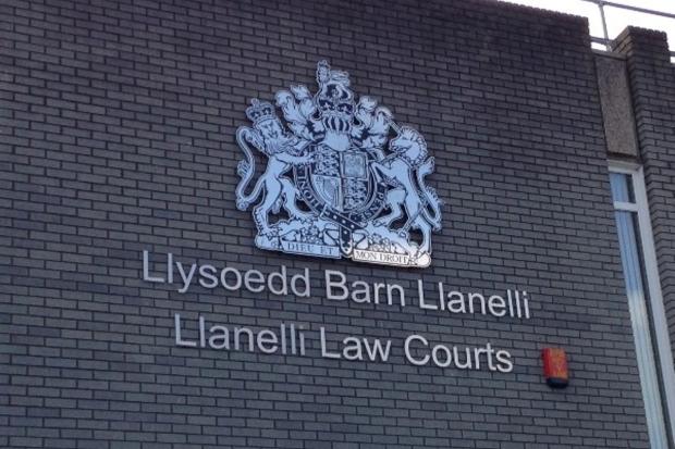 Ammanford woman in court charged with wounding and possessing an offensive weapon