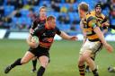 SHIFT: Lloyd Burns on the charge for the Dragons against Wasps in Cardiff