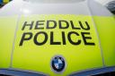 A man from Merseyside admitted obstructing police officers and driving in the Ammanford area whilst disqualifed.