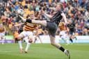 BEATEN: Will Evans in action for County at Bradford