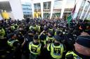 Demonstrators face police during a protest against the participation of Israeli contestant Eden Golan ahead of the final of the Eurovision Song Contest in Malmo, Sweden (Andreas Hillergren/TT News Agency/AP)
