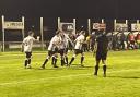 Ammanford celebrate scoring in the tense derby match