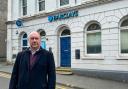 Cefin Campbell outside Barclays in Llandeilo