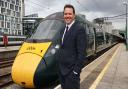 Lee Waters with one of the GWR trains. Picture: GWR