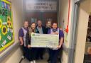 The funds from the Cwm Gwendraeth tractor run were presented to the Wish Fund team