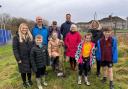 Children from Penygroes and Saron schools planted the first apple tree in the park