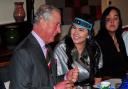 Prince Charles chats to the president of the National Inuit Youth Council, Maatalii Aneraq-Okalik during the round table discussion.