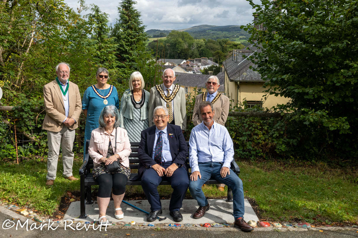 The bench at Penlan park with family members of DT Davies and local dignitaries Picture Mark Revitt 