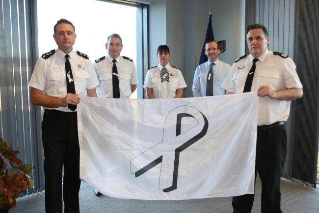 Dyfed-Powys Police with the White Ribbon flag