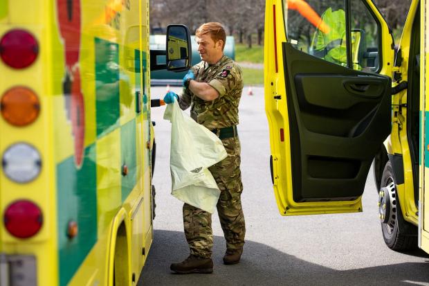 South Wales Guardian: Members of the British Army during training in April 2020 to support the Welsh Ambulance Service in the battle against Covid-19. Picture: Via PA