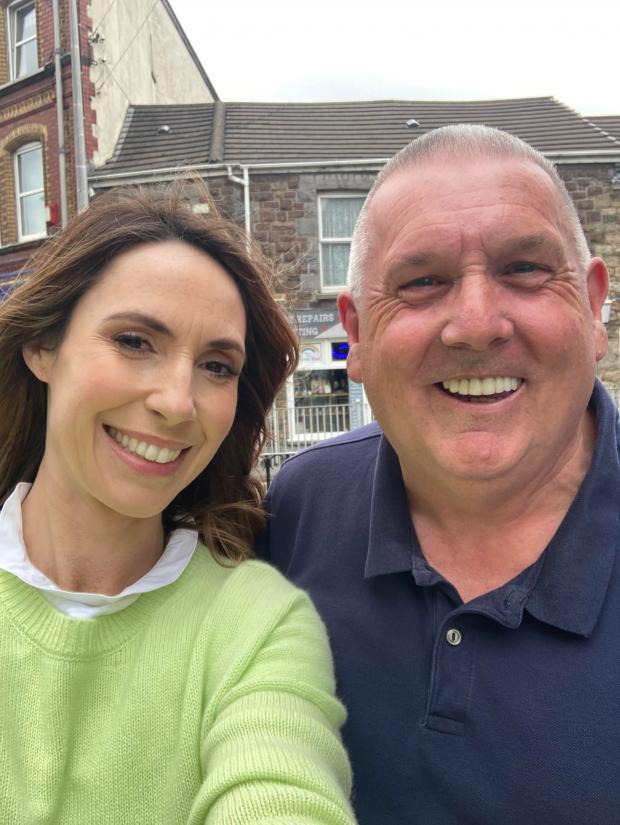 South Wales Guardian: Alex took time to speak to locals in Ammanford. The presenter is pictured with a star-struck Lawrence Molloy
