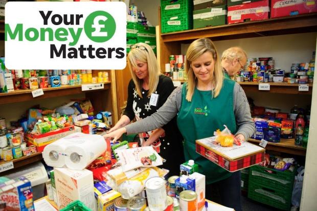 Foodbanks are among those able to support anyone struggling with the cost of living crisis. Pictured: Volunteers at foodbank in Malpas.