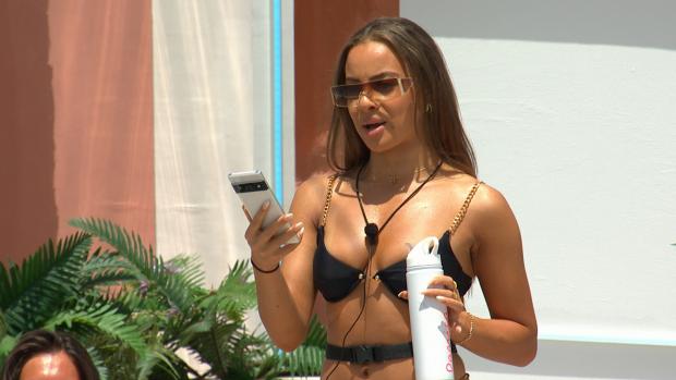 South Wales Guardian: Danica gets a text as Love Island continues tonight at 9pm on ITV2 and ITV Hub. Episodes are available the following morning on BritBox. Credit: ITV