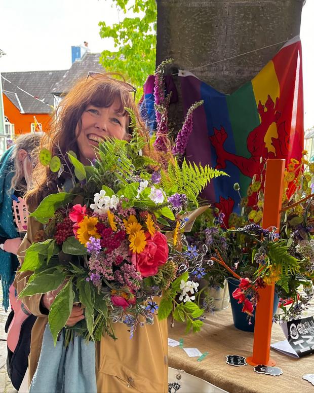 South Wales Guardian: Outbloom farms was one of the stalls celebrating Pride with their floral jug arrangements