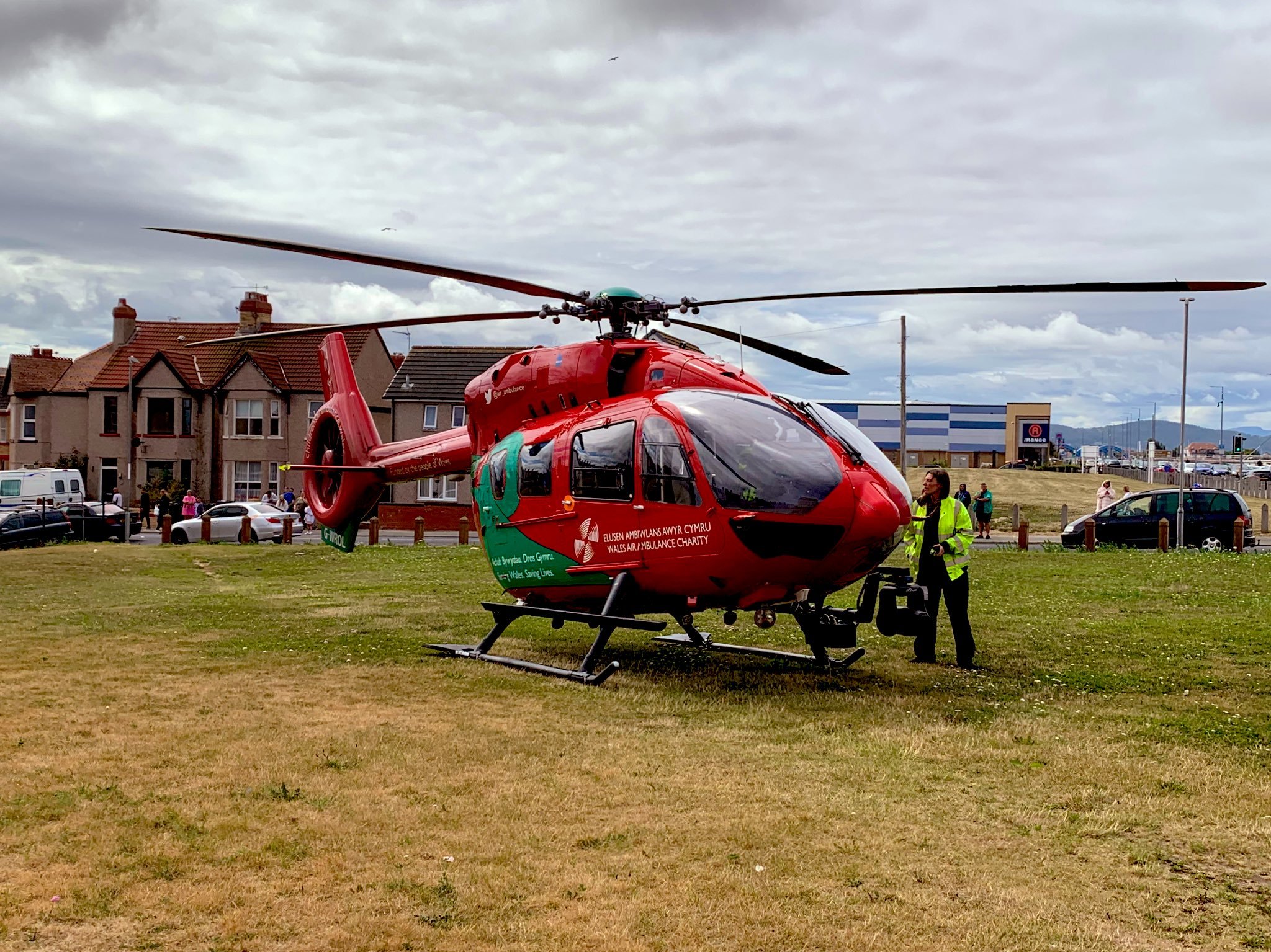 A Wales Air Ambulance lands in Rhyl. Photo: Kit Morgan