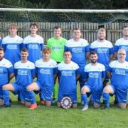 Cwmamman United’s third team with their 2019/20 Neath Reserve League trophy