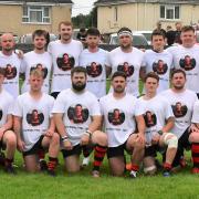 Llandybie RFC marked the loss of former player Daniel Wigley in Canada by wearing special shirts for the pre-match warm up Picture: John B R Davies