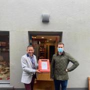 Christoph Fischer and Owen James with the collection box at Mary Ellen's @ 139