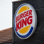 A buy-one-get-one-free deal is being offered for the returning Burger King menu items (PA)