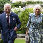 HRH Prince Charles and Camilla walking from Llwynywermod farmhouse to the barn
Picture: PR