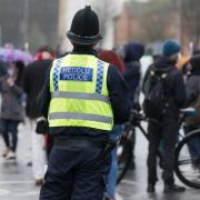 A South Wales Police officer at a protest in Cardiff, 2021. (Picture: Huw Evans Agency)