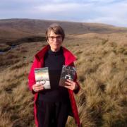 Jane Burnard with a copy of The Cry of the Red Kite