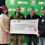 The cheque being presented at the Winter Fair