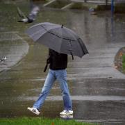 Heavy rain is expected to cause some travel disruption and flooding on Saturday morning.