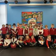 Ysgol Ty-Croes' nursery and reception pupils in Welsh attire.