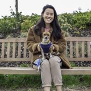 Jackie Yip with one of the dogs she has fostered. Picture: Dogs Trust Cardiff