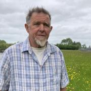 Smallholder Robert Moore, who is objecting to a compulsory purchase order, on land how owns by the River Towy