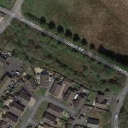 The plans are for four homes on the plot of land off Saron Road