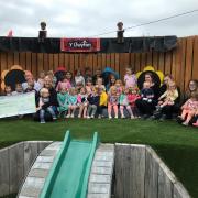 Staff and children at Twts Tywi Nursery raised £3,000 for Glangwili Hospital's chemotherapy day unit